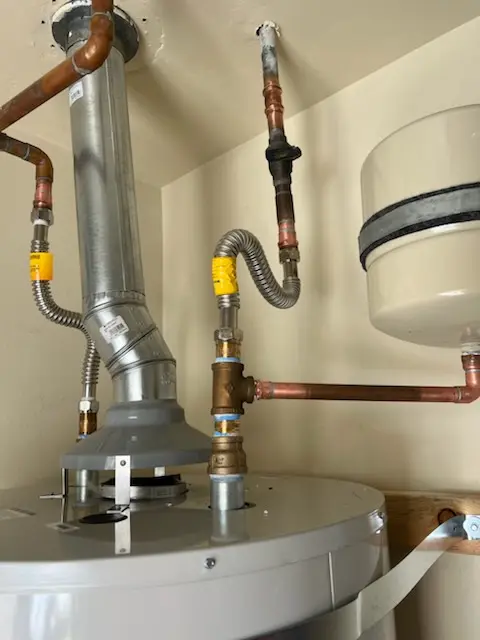 Water heater installation and plumbing repair in Puritan